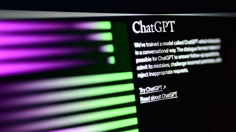 photograph of a computer monitor showing the chatgpt interface